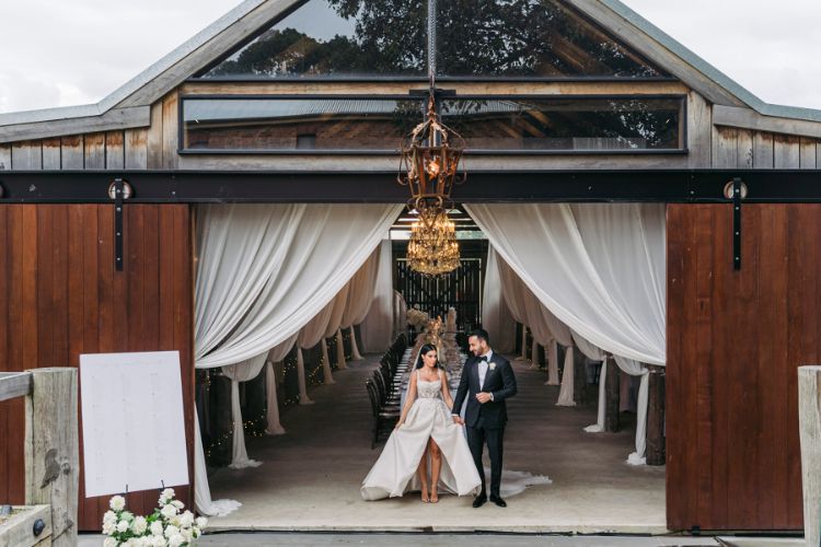 Rustic barn reception venue with elegant draping at Anambah House