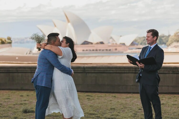 Fun wedding ceremony at the Sydney Opera House by Mick Goldie