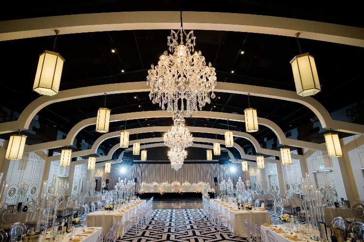 Grand reception venue with dramatic chandeliers in Western Sydney