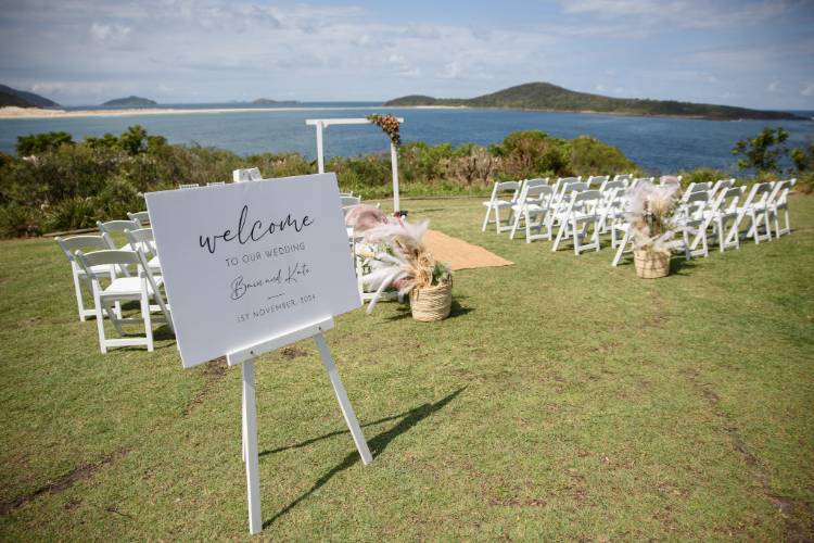 Oceanfront wedding ceremony by Newcastle wedding planner Hunter Events