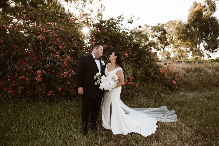 Plus size white wedding gown with off the should straps by Madi Lane