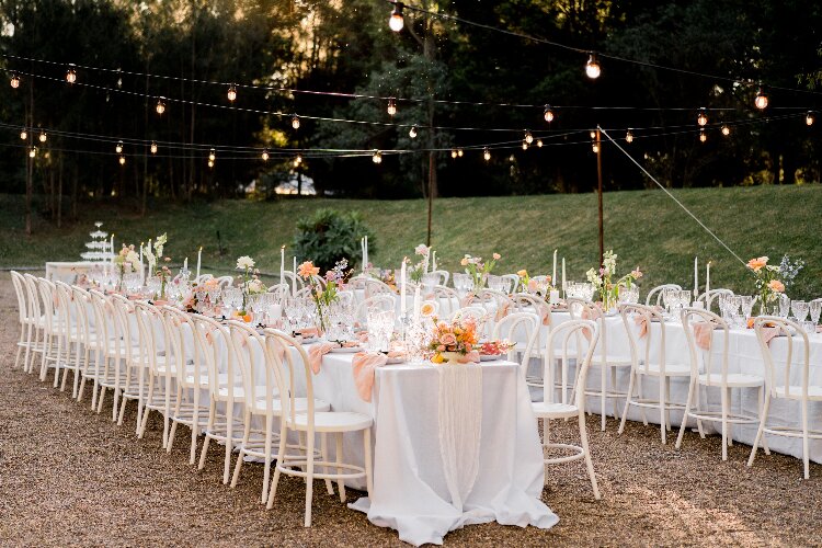 Rustic wedding reception in the Tuscan rainforest garden at Leaves Fishes
