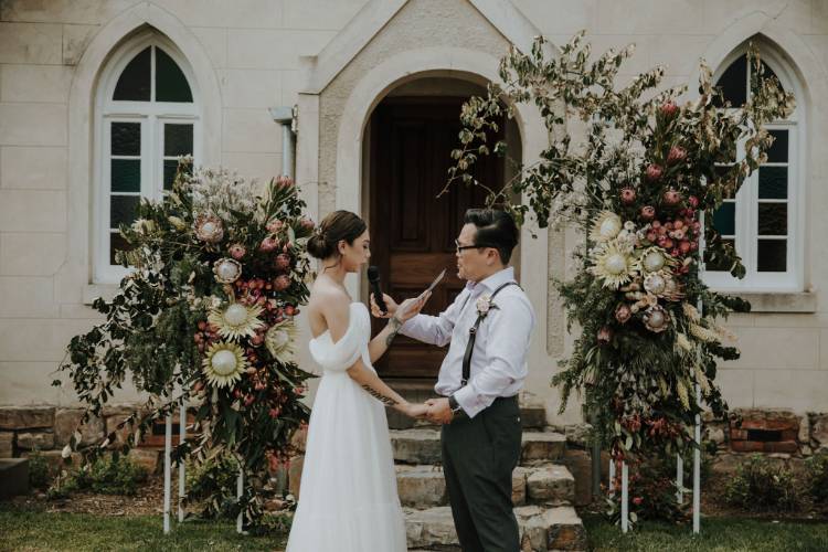 Wedding coordinated by Form Over Function with lush floral pillars