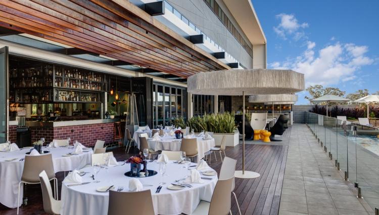 Atura Blacktown outdoor dining and reception area near swimming pool