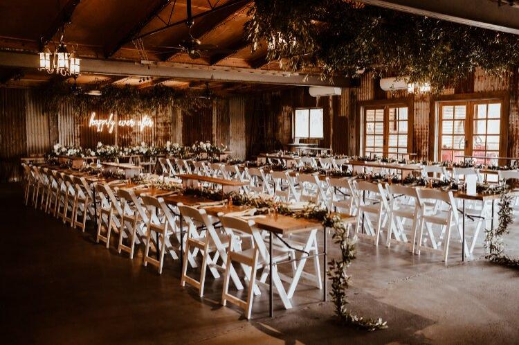 Barn wedding space set up for rustic reception at Adams Peak Country Estate