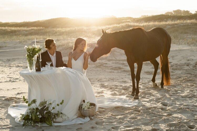 Beach wedding reception space with horse at Keith Hall NSW 