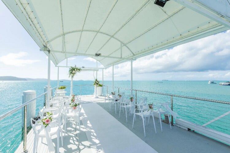 Stunning ceremony wedding venue on a Whitsundays jetty at Coral Sea Resort